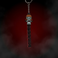 Chibi Annabelle keychain with bold ANNABELLE horror lettering on blood red dark background